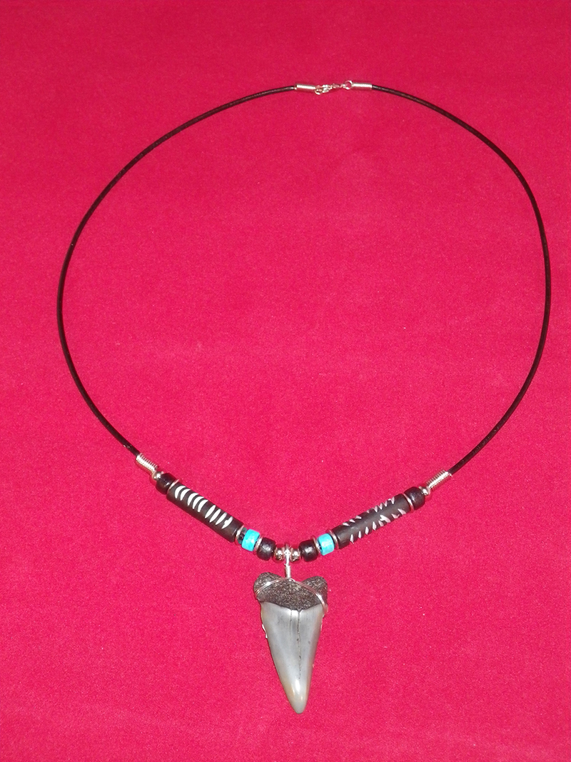 Beaded shark tooth necklace, handmade by... - Depop